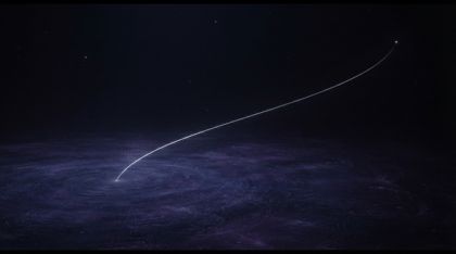 In the vast silent blackness of intergalactic space a faint deep-purple and indigo field of pure, dormant consciousness rests like the surface of an infinitely deep ocean; from it a single, impossibly fine filament of silver-white light has unspooled, reaching with quiet purpose toward a distant, lonely star.